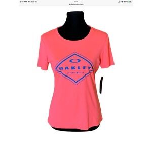 Women’s Neon orange Oakley short sleeve shirt Size Medium New with tag